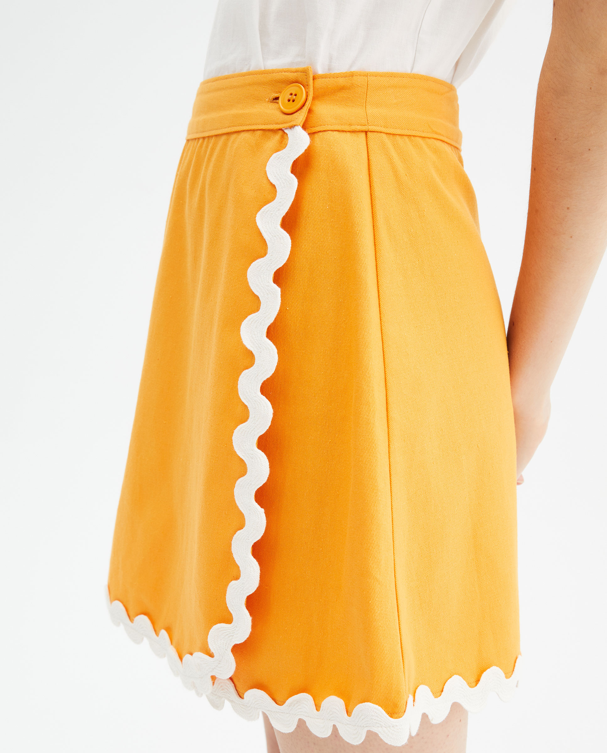 Πορτοκαλί μίνι φούστα με zic zac σχέδιο Compania Fantastica